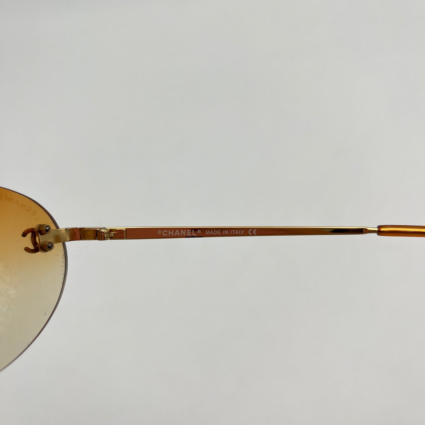 Chanel Vintage Orange Rimless Sunglasses
