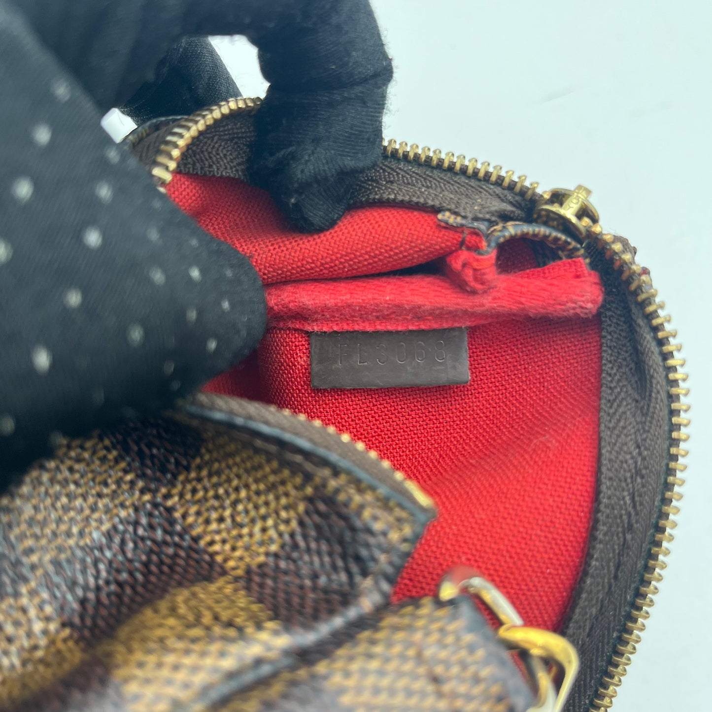 LV Damier Ebene Mini Pochette