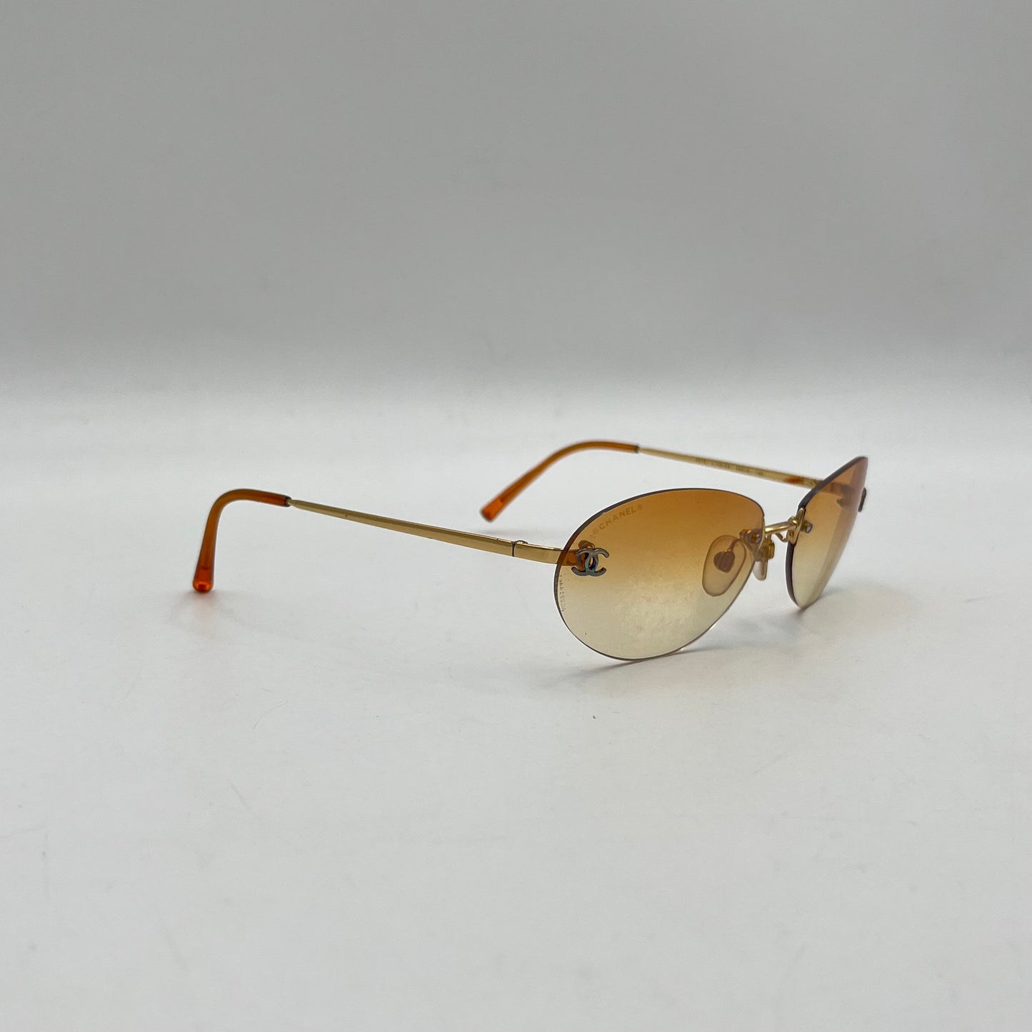 Chanel Vintage Orange Rimless Sunglasses