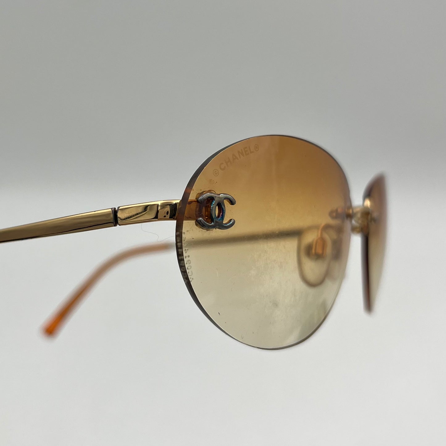 Chanel Vintage Orange Rimless Sunglasses