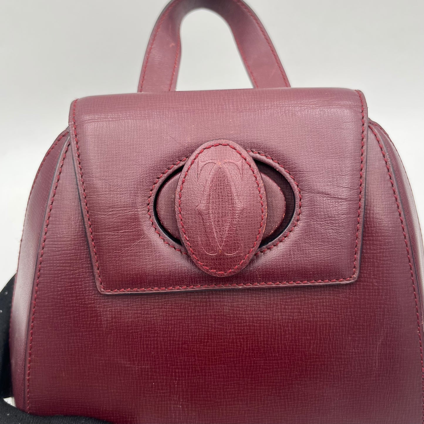 Cartier Paris Burgundy Twist Lock Small Backpack