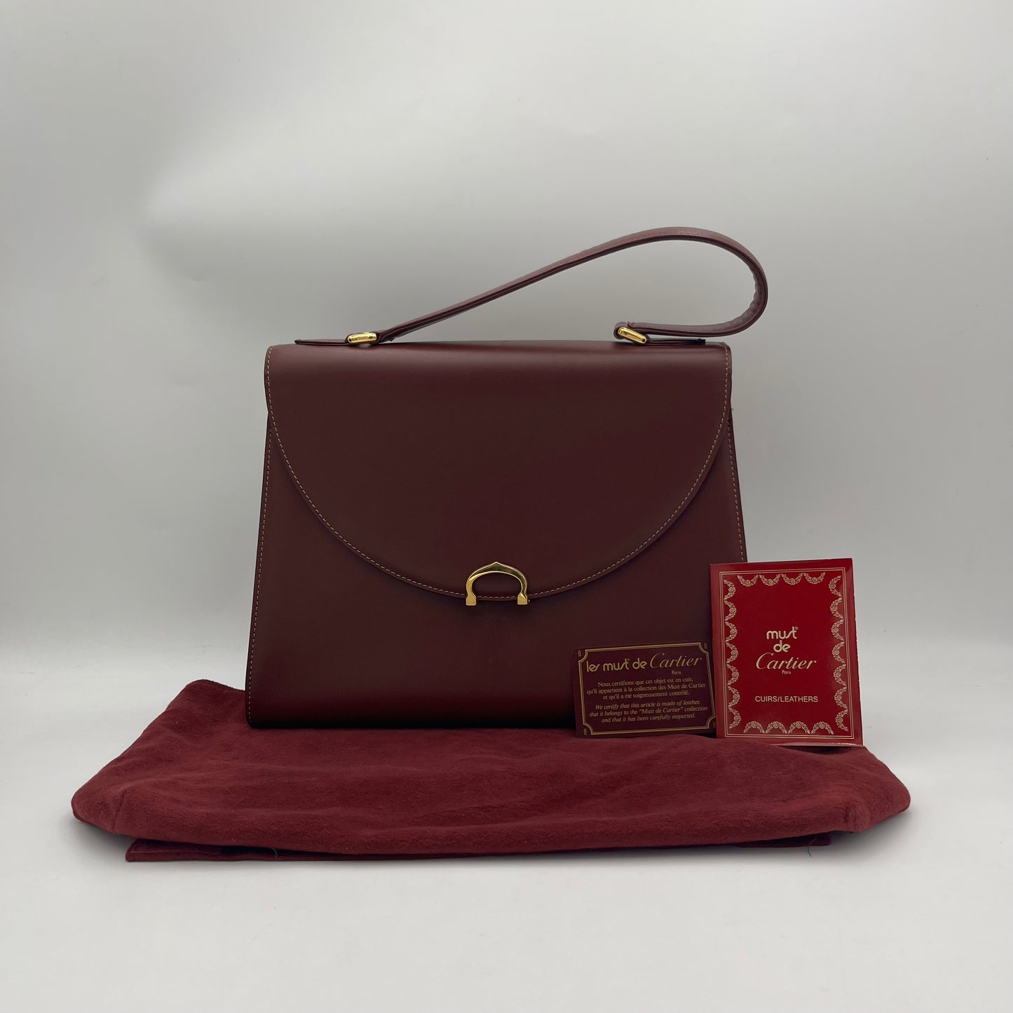 Cartier Paris Burgundy Leather Gold Charm Logo Kelly