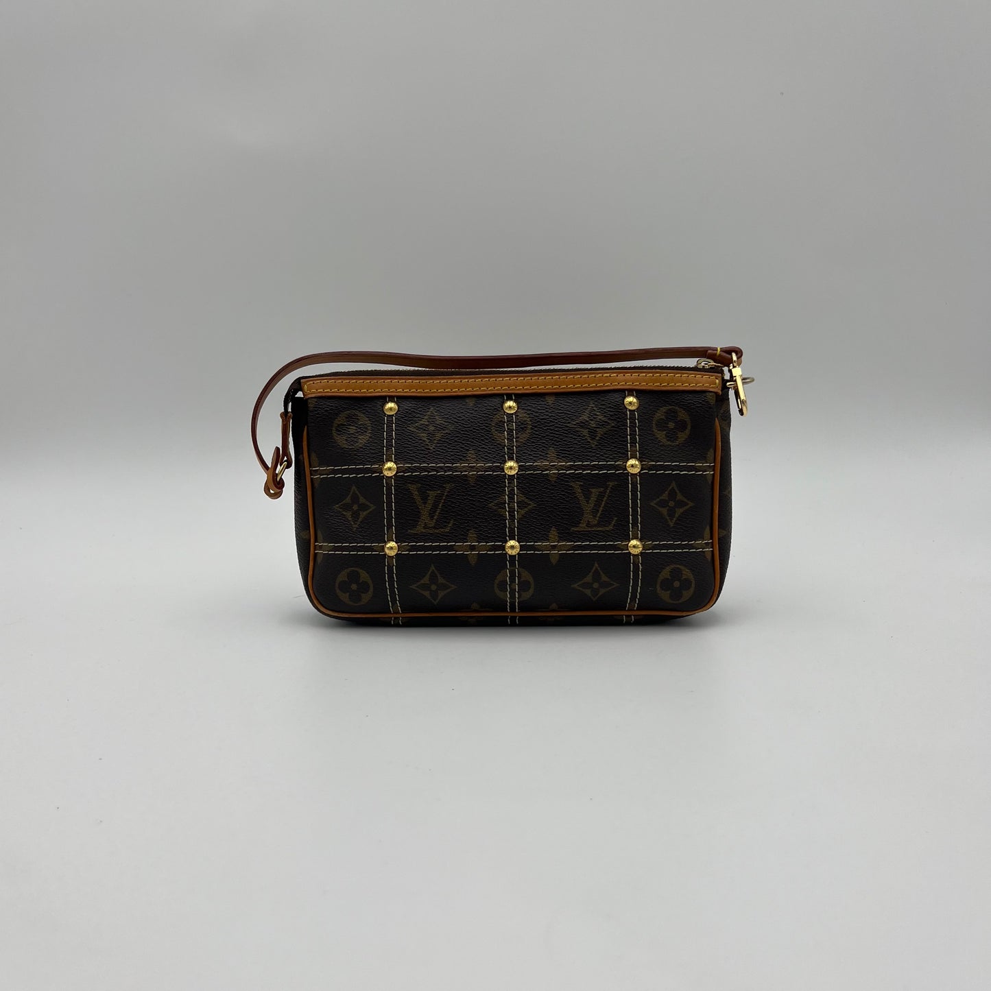 LV Limited Edition Monogram Canvas Riveting Pochette designed by Marc Jacobs