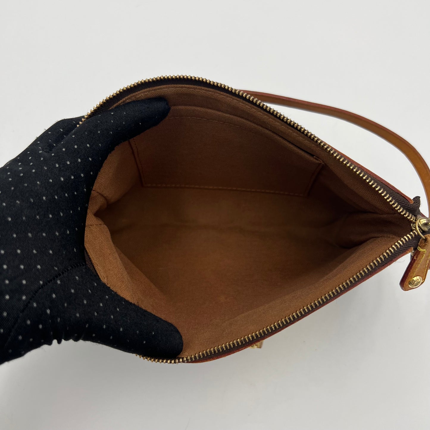 LV Limited Edition Monogram Canvas Riveting Pochette designed by Marc Jacobs