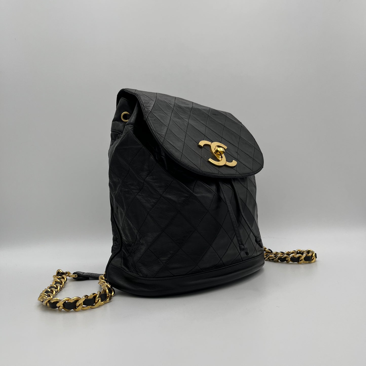 Chanel Vintage Black Quilted Lambskin Turn-Lock Flap Chain Backpack Series 1