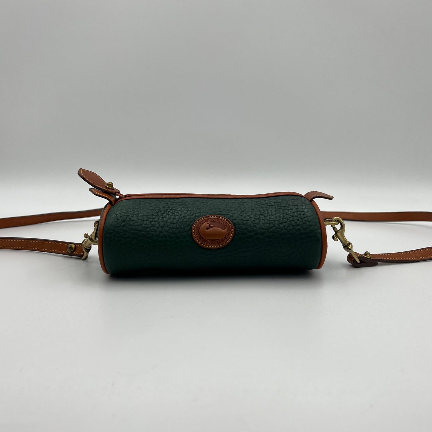 Dooney and Bourke Pebbled Green Leather Mini Barrel Crossbody