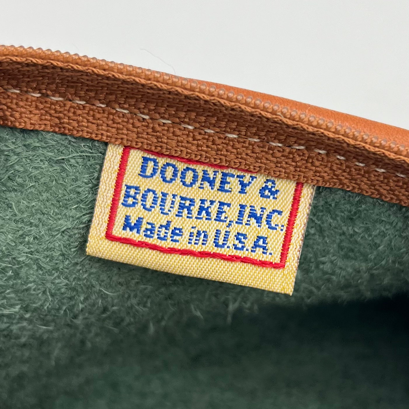 Dooney and Bourke Pebbled Green Leather Mini Barrel Crossbody