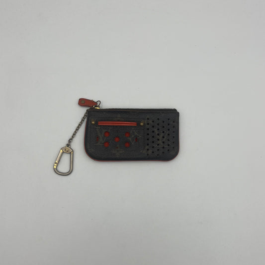 LV Perforated Monogram Key Cles