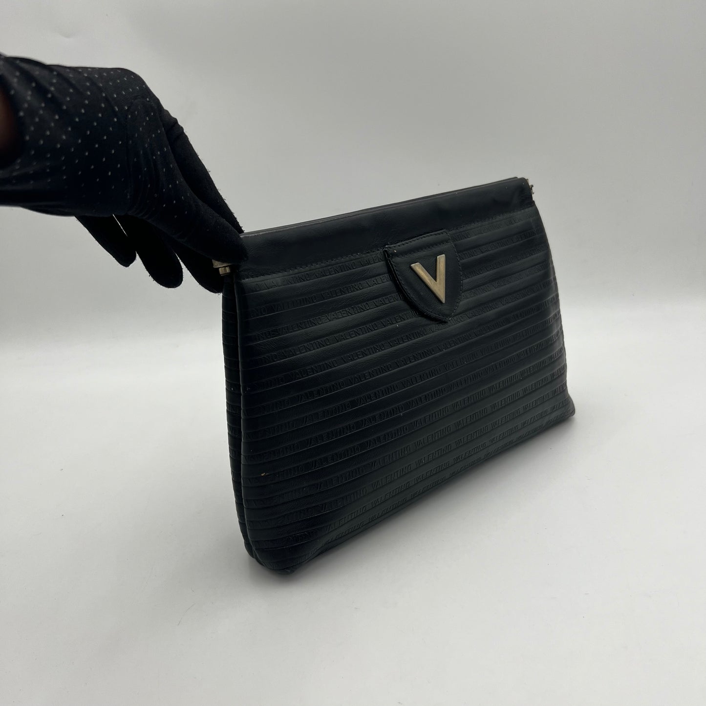 Mario Valentino Monogram Embossed Black Clutch