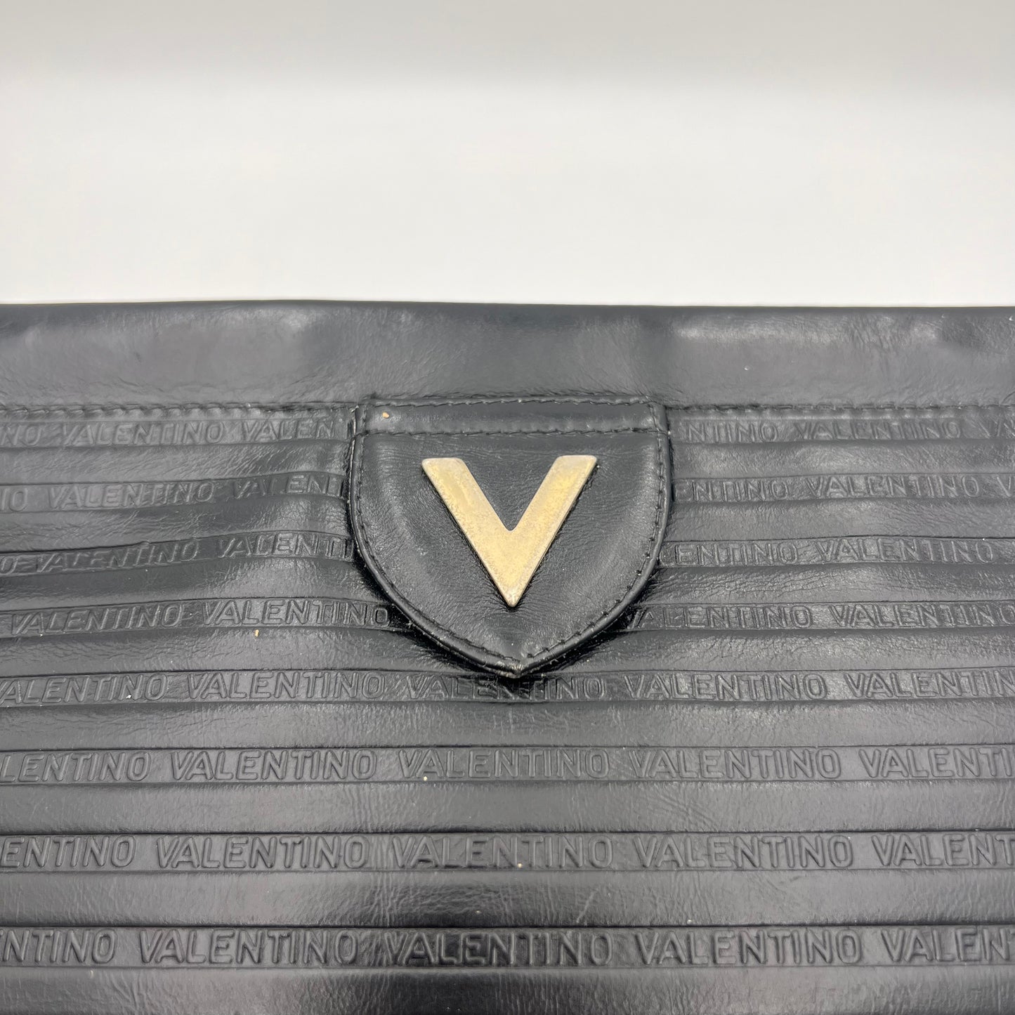 Mario Valentino Monogram Embossed Black Clutch