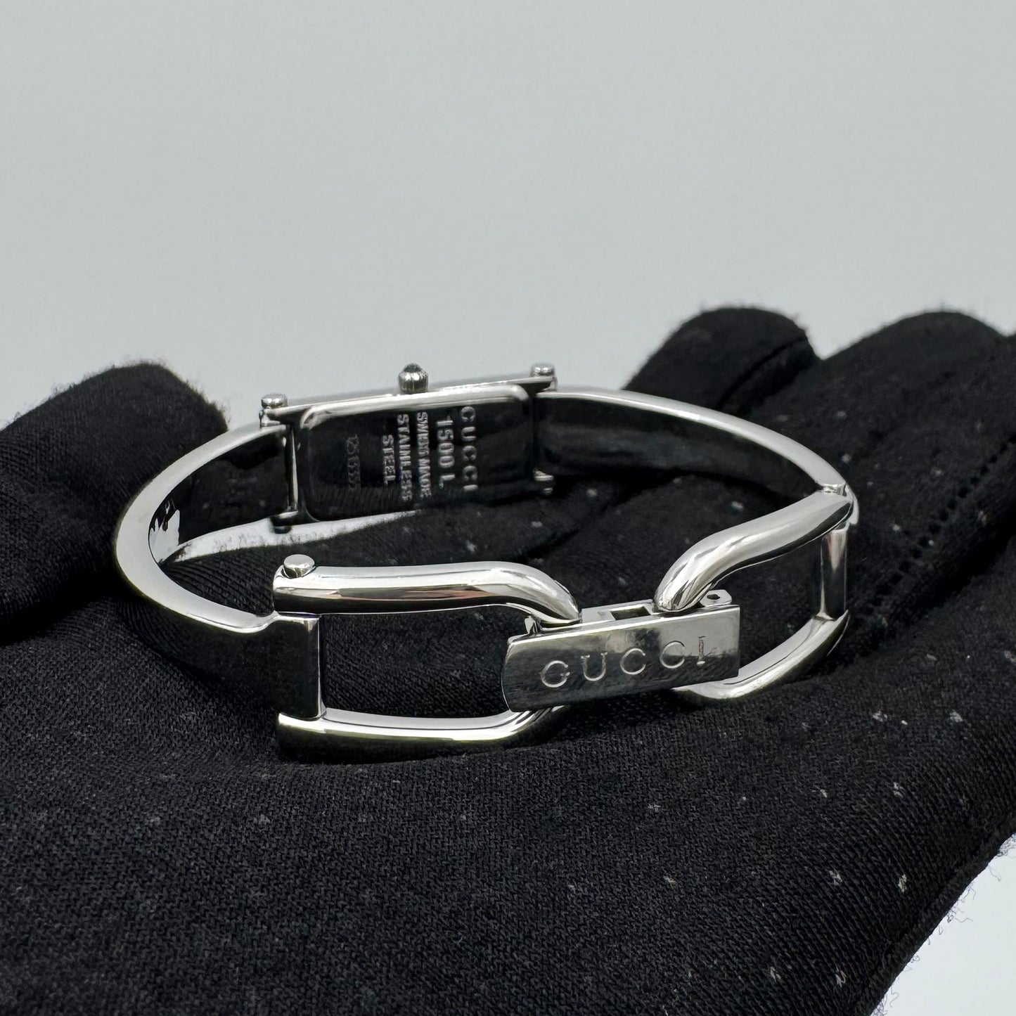 Gucci 1500L Black Dial Rectangle with Single Diamond Marker Quartz Ladies Watch