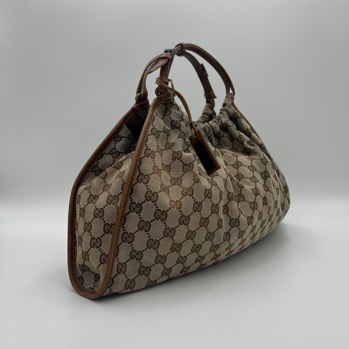 Gucci Monogram Canvas Drawstring Hobo Bag